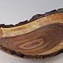 This Black Walnut natural edge bowl is about 14" long x 10 1/2 wide, and 5" tall at the tip of the wings.